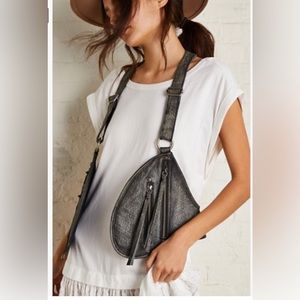 Olympia Leather Harness Bag New. Dark black, never used.